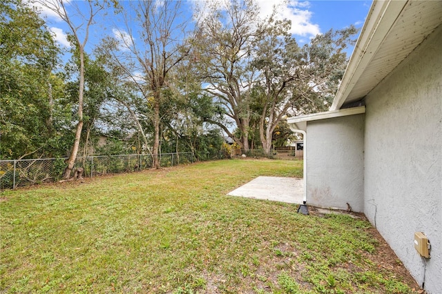 view of yard featuring a fenced backyard and a patio area