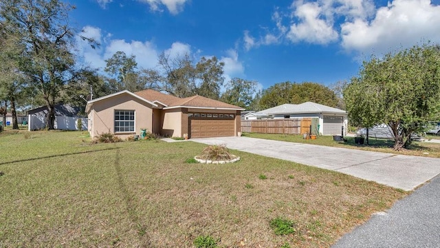 ranch-style home with a garage and a front lawn