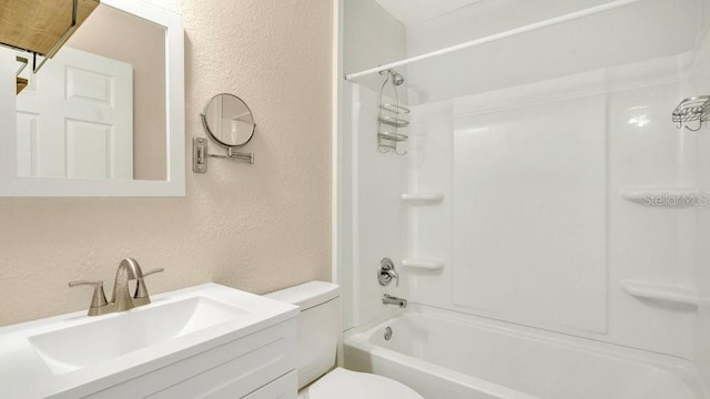 full bathroom featuring shower / bathtub combination, vanity, and toilet