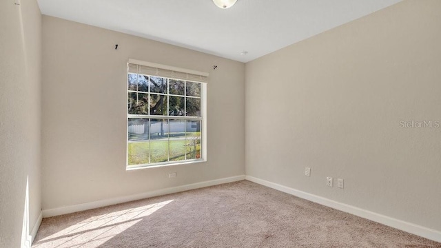 view of carpeted spare room