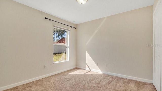 view of carpeted spare room