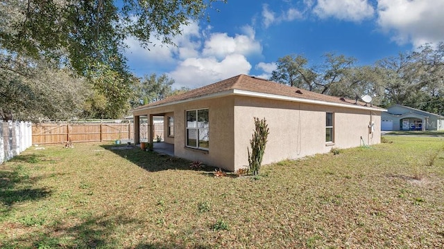view of home's exterior featuring a yard