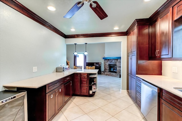 kitchen with beverage cooler, a peninsula, light countertops, and dishwasher