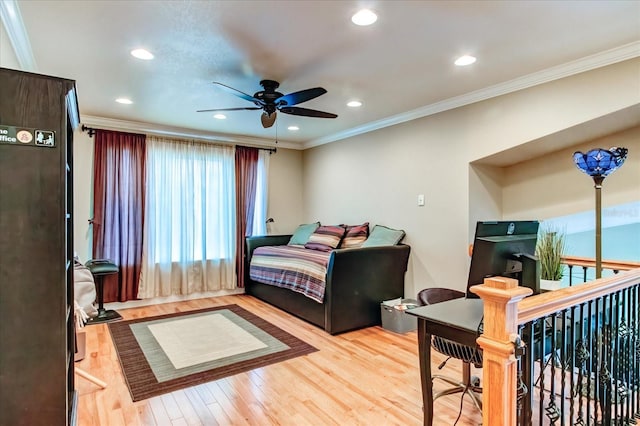 bedroom with recessed lighting, light wood-style flooring, and crown molding