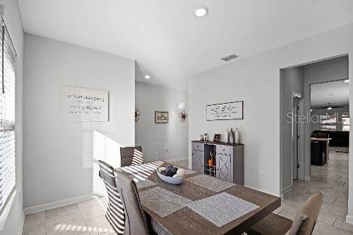 dining room featuring plenty of natural light