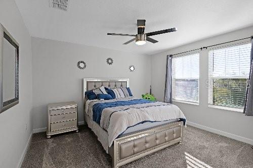 bedroom featuring ceiling fan