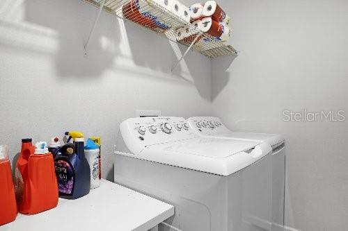 washroom with washer and clothes dryer