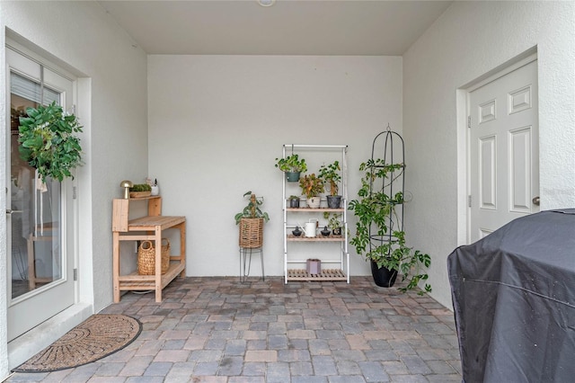 view of patio with a grill