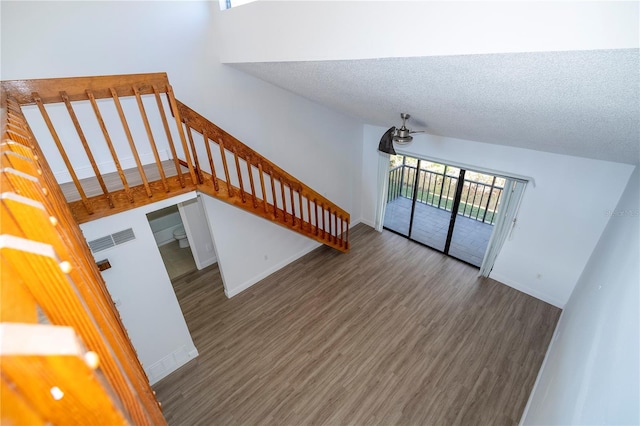 interior space with hardwood / wood-style floors and a textured ceiling