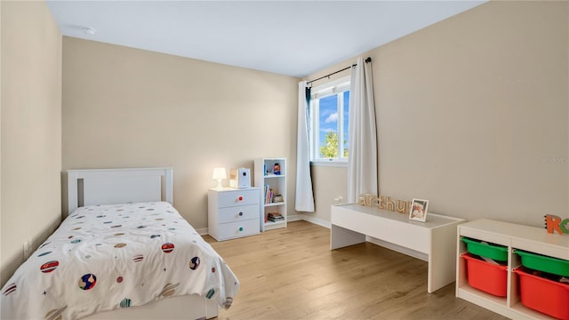 bedroom featuring hardwood / wood-style floors