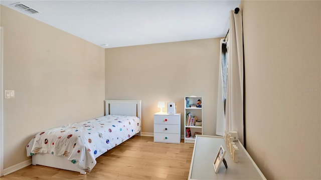 bedroom featuring light wood-type flooring