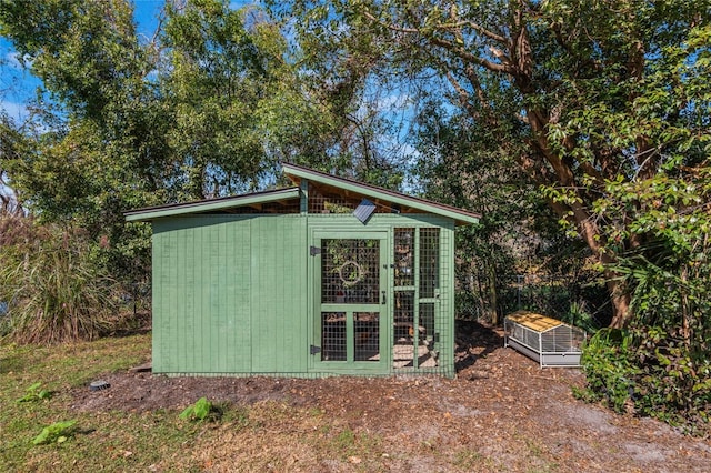 view of outbuilding with an outdoor structure