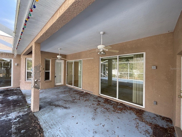 view of patio / terrace featuring ceiling fan