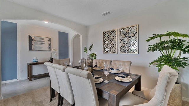 view of tiled dining space