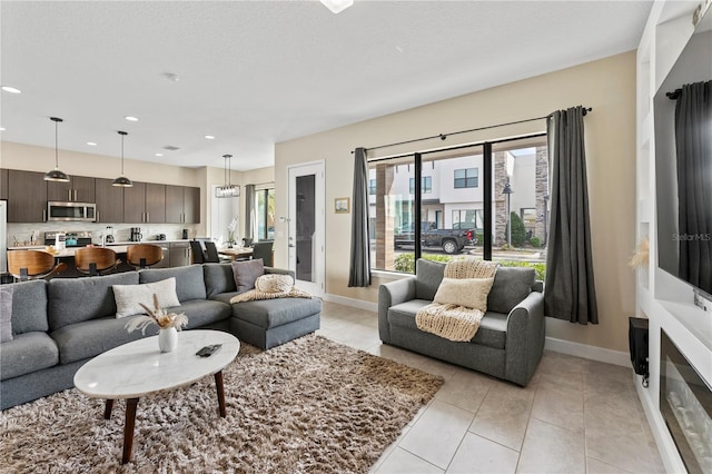 living room with light tile patterned floors