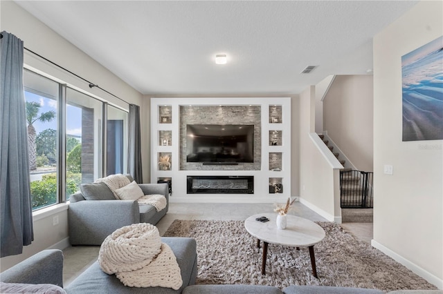 living room featuring a textured ceiling