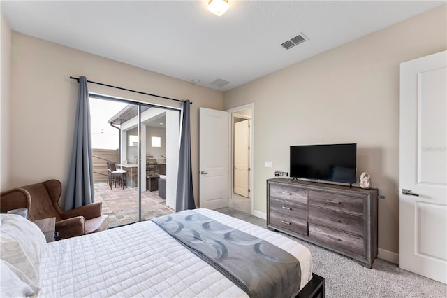 bedroom featuring light colored carpet