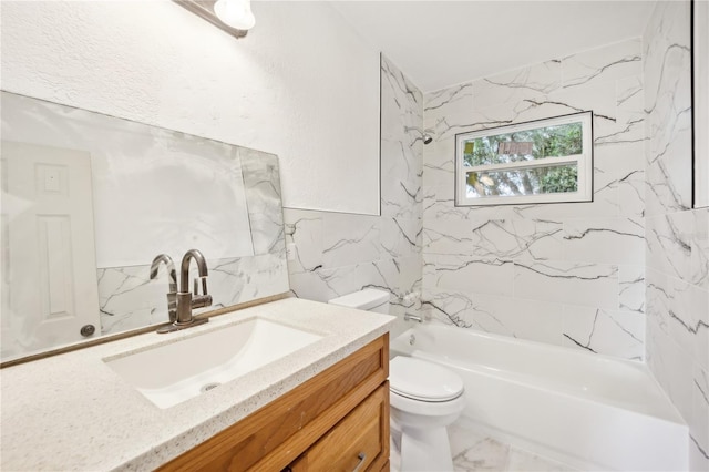 full bathroom with vanity, tiled shower / bath, tile walls, and toilet