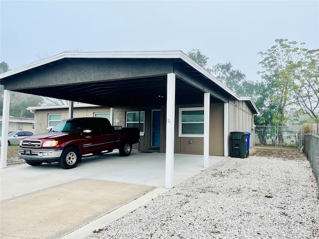 exterior space with a carport