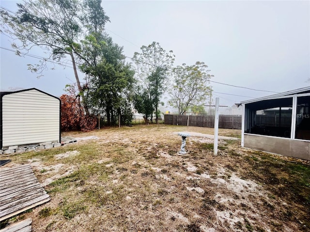 view of yard featuring a sunroom