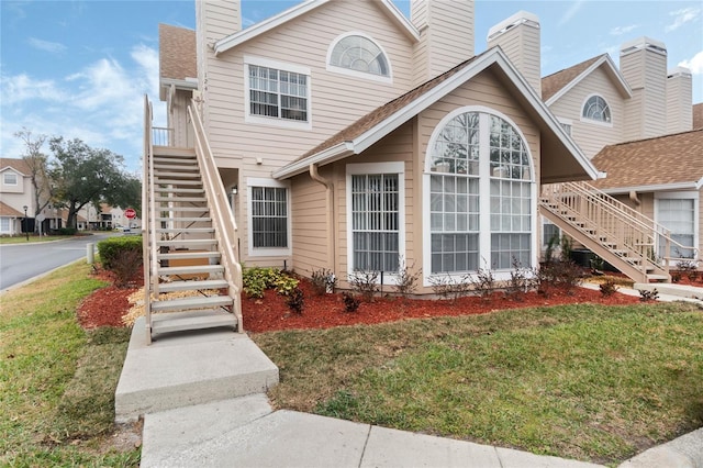 view of front of house with a front lawn