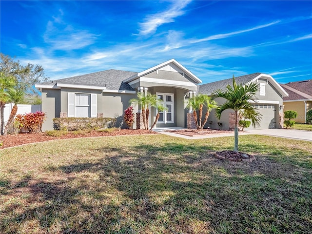 ranch-style home featuring a garage and a front yard