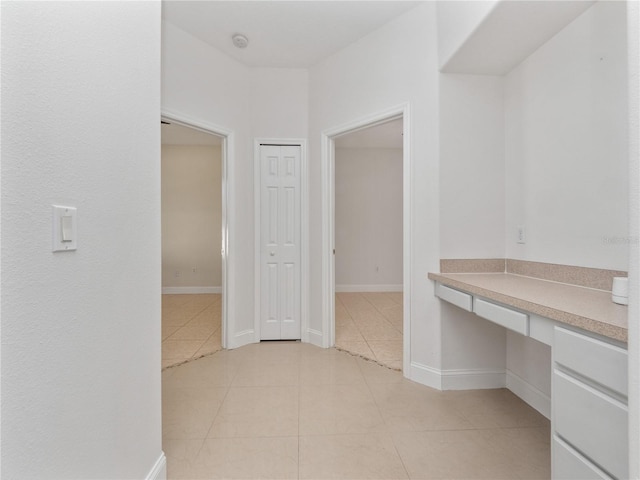 interior space with light tile patterned floors