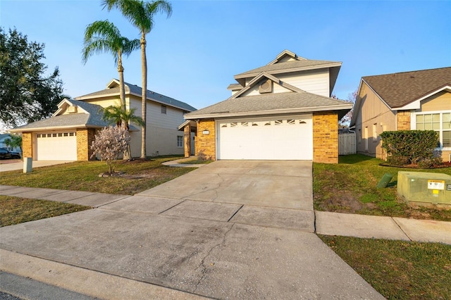 view of front of house featuring a garage and a front yard