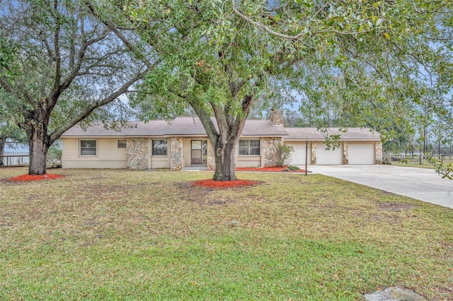 2770 Windsong Ln, Saint Cloud, FL 34772 - ranch-style house featuring a garage and a front lawn