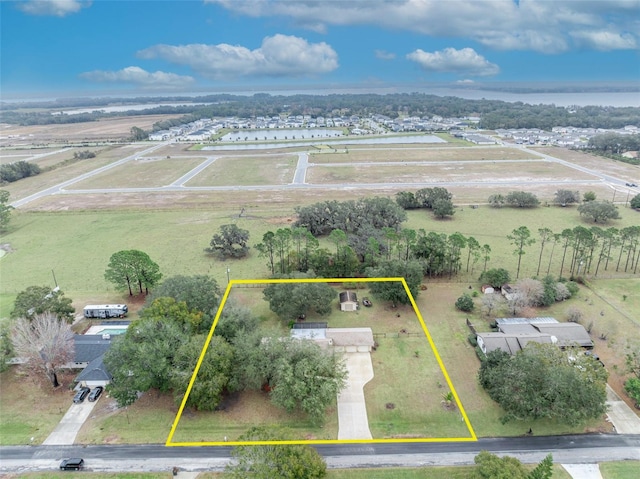 aerial view featuring a water view and a rural view