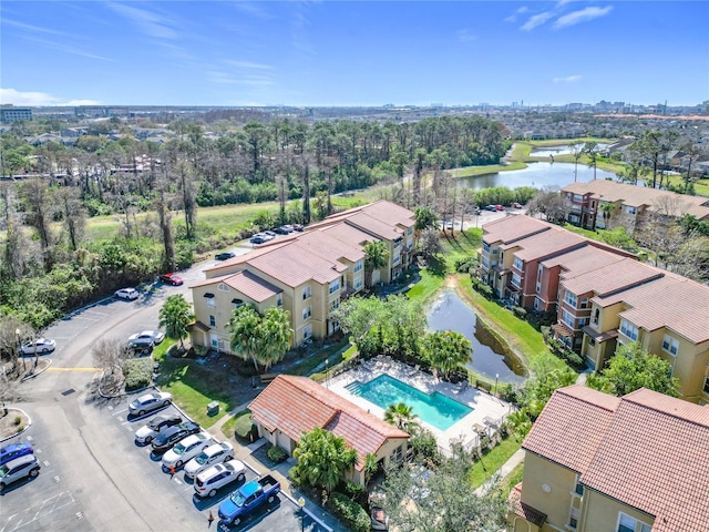 drone / aerial view with a water view