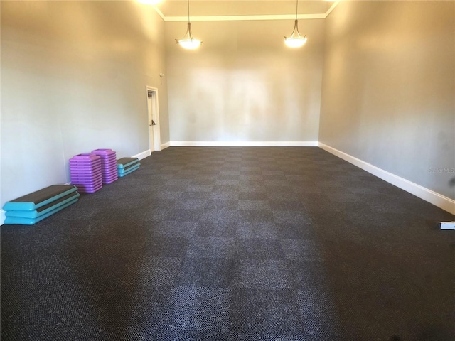 empty room featuring ornamental molding