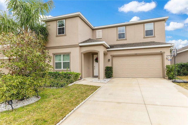 view of front of property with a garage