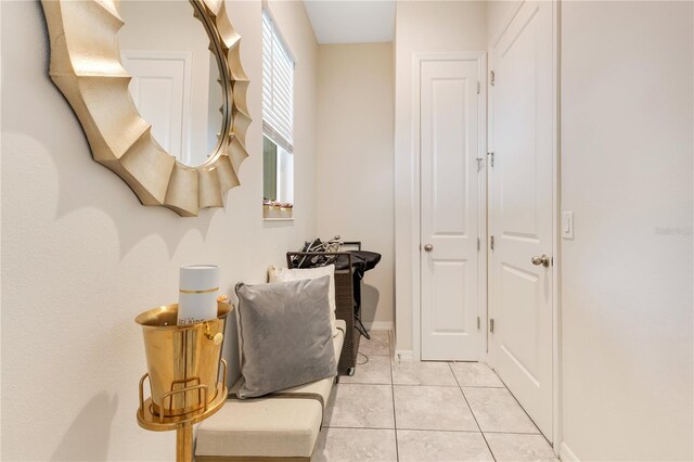 interior space featuring light tile patterned floors