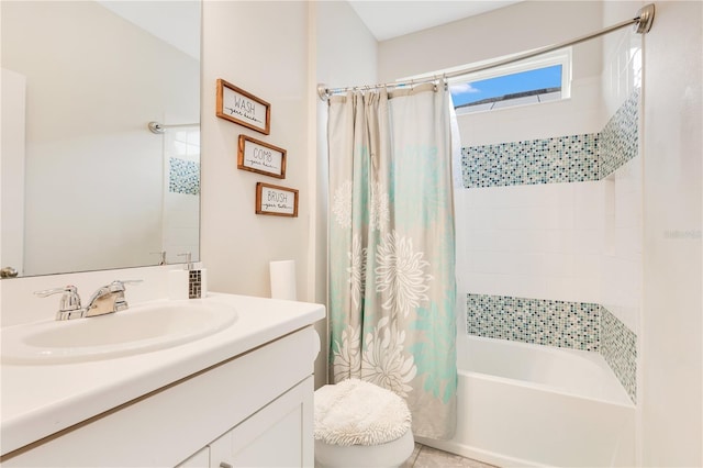 full bathroom featuring vanity, toilet, and shower / bath combo