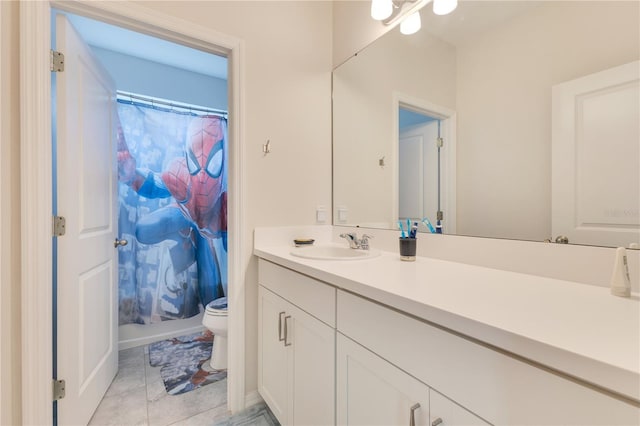 full bathroom with tile patterned floors, vanity, toilet, and shower / tub combo with curtain