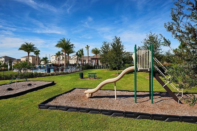 view of playground featuring a yard