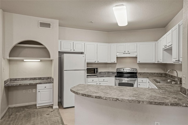 kitchen with white cabinetry, appliances with stainless steel finishes, and sink