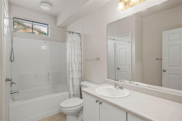 full bathroom featuring vanity, shower / bathtub combination with curtain, and toilet