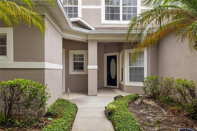980 Crestwood Commons Ave, Ocoee, FL 34761 - property entrance featuring stucco siding and a porch