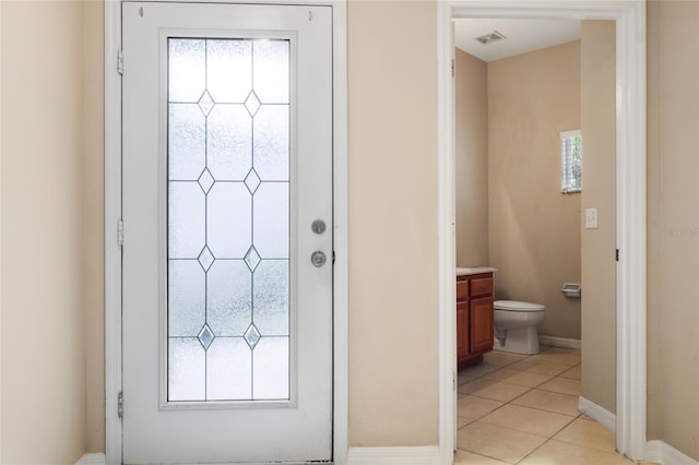 980 Crestwood Commons Ave, Ocoee, FL 34761 - bathroom with vanity, tile patterned flooring, toilet, and baseboards