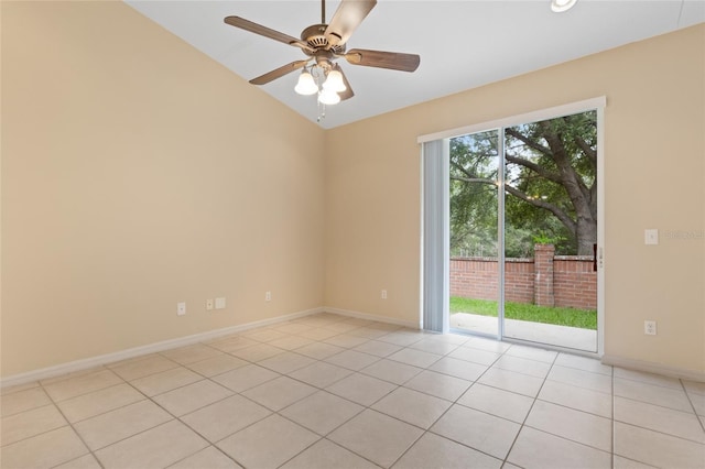 980 Crestwood Commons Ave, Ocoee, FL 34761 - spare room with light tile patterned flooring, a ceiling fan, baseboards, and vaulted ceiling