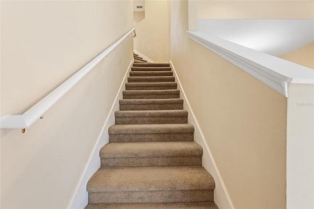 980 Crestwood Commons Ave, Ocoee, FL 34761 - staircase featuring carpet floors