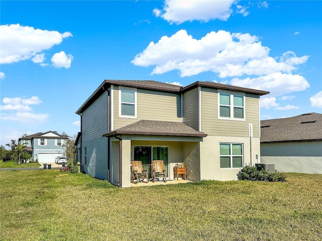 back of house featuring a patio, central AC, and a lawn