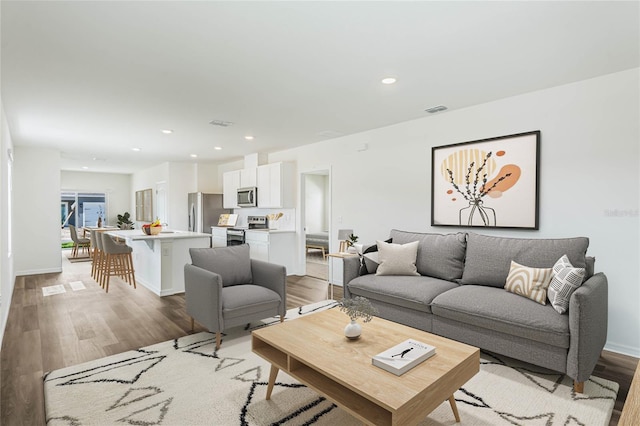 living room with light wood-type flooring