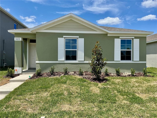 5626 Paddock Fence Ln, Apopka, FL 32712 - single story home with a front lawn and stucco siding