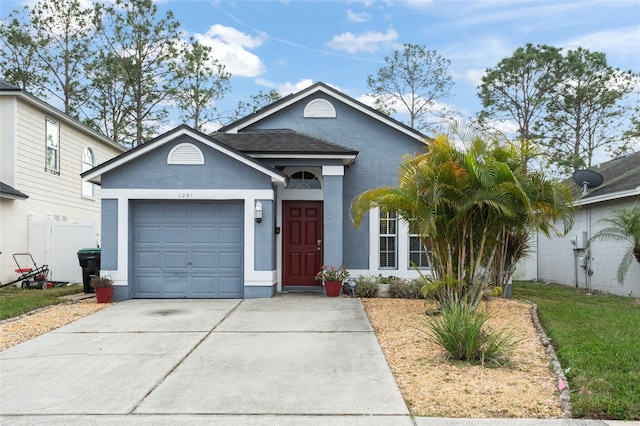 view of front of property featuring a garage