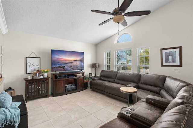 tiled living room with vaulted ceiling, ceiling fan, and a textured ceiling