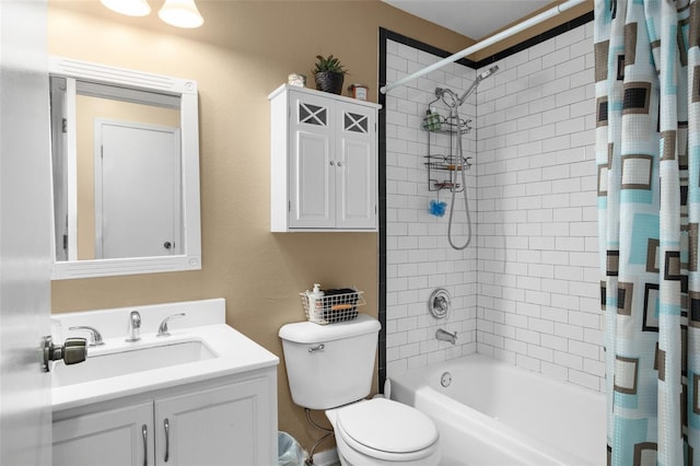 full bathroom with vanity, toilet, and shower / tub combo with curtain