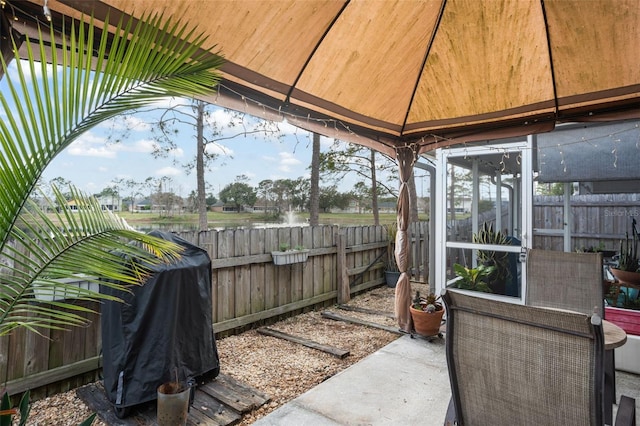 view of patio / terrace with a grill and a gazebo